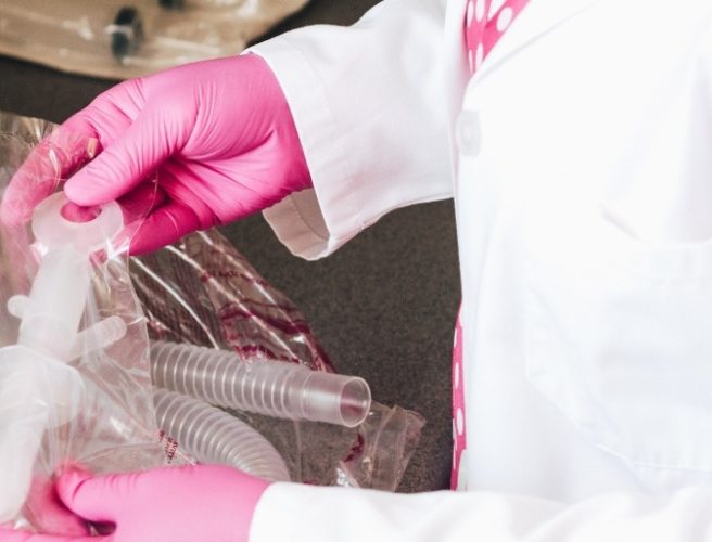 Linda Booth preparing to perform a colon hydrotherapy treatment